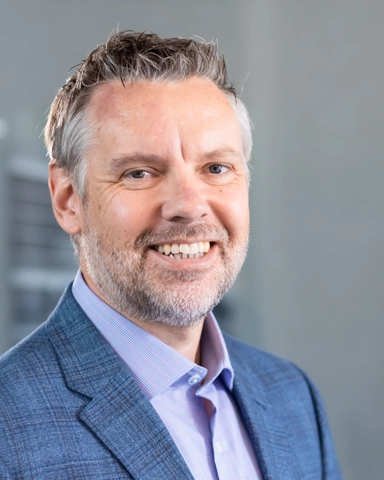 portrait of a smiling person in business attire